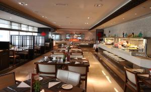 A seating area at Ramada Downtown Abu Dhabi