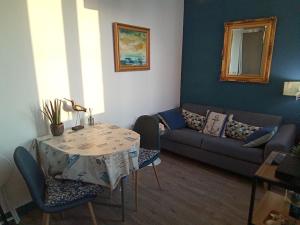 Istumisnurk majutusasutuses Le rivage d'Hélène- Appart Vue Mer - 2 pers - 1 ch
