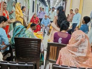 a group of people sitting around in a room at Flamingo inn-KV tower 2nd floor, Paidleganj Kalepur,Kasia road, Gorakhpur in Gorakhpur