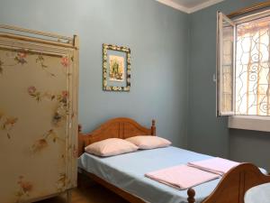 Postel nebo postele na pokoji v ubytování Guest House One Two Three