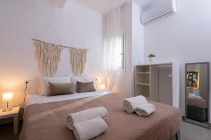 Posteľ alebo postele v izbe v ubytovaní Venezian View Apartment