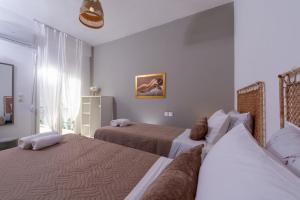 Łóżko lub łóżka w pokoju w obiekcie Venezian View Apartment