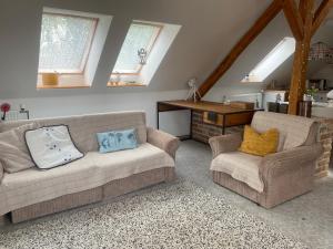 Posezení v ubytování Podkrovní studio apartment pro 1-5 osob