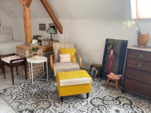 Posezení v ubytování Podkrovní studio apartment pro 1-5 osob