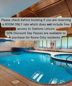 a swimming pool with a quote about a room only rate which does not include free at The Waterloo Hotel in Betws-y-coed