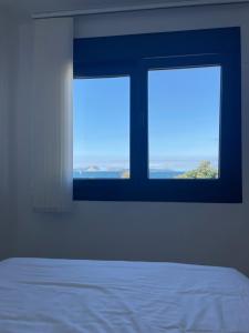 Кровать или кровати в номере Hostal Montevideo beachfront