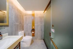 Koupelna v ubytování Cosy Feeling Hotel - Beijing Headquarters Xinfadi