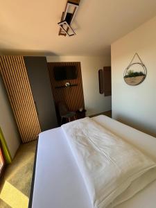 Postel nebo postele na pokoji v ubytování Rebstöckel + 19 fotografií