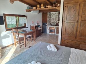 Postel nebo postele na pokoji v ubytování B&B Monte Tavolino