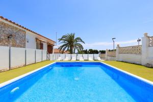 a swimming pool in the backyard of a house at PANORAMIC VILLA x in Salou