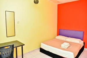 Postel nebo postele na pokoji v ubytování Hotel Rim Global, Klang