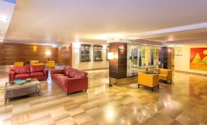 a large living room with couches and chairs at Virgilio Grand Hotel in Sperlonga