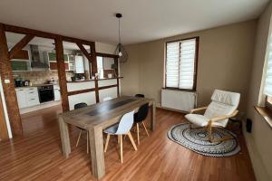 Kuchyň nebo kuchyňský kout v ubytování Grand appartement à Barr
