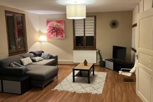 Posezení v ubytování Grand appartement à Barr