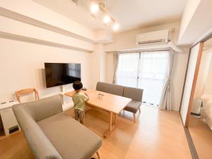 TV a/nebo společenská místnost v ubytování Ushamy's KOKURA STAY No 04