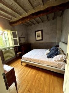 Giường trong phòng chung tại La Grande Quercia