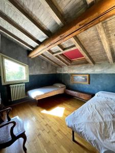 Giường trong phòng chung tại La Grande Quercia +8 ảnh