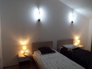 Ένα ή περισσότερα κρεβάτια σε δωμάτιο στο Appartement charmant près du centre d'Avignon, 60m², piscine
