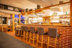 Lounge nebo bar v ubytování Pension U Kohoutů