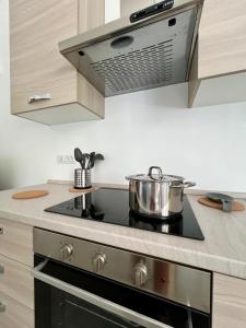 Kuchyň nebo kuchyňský kout v ubytování Health&Beach Apartment