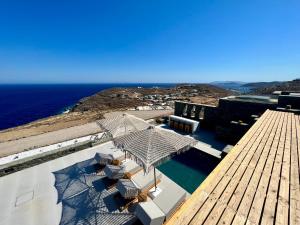 a view of the ocean from the roof of a building at Enilio Mera in Sifnos
