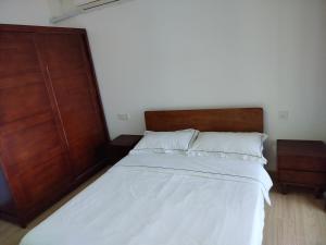 Postel nebo postele na pokoji v ubytování 静夜枫语806