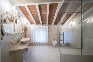 Kúpeľňa v ubytovaní Regia Rosetta - Royal Rooms Borghetto