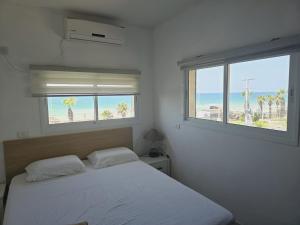 Ένα ή περισσότερα κρεβάτια σε δωμάτιο στο GK apartment Beauty