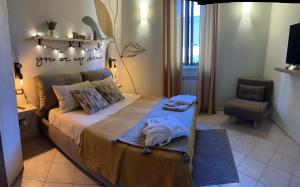 Letto o letti in una camera di Mariella sul borgo