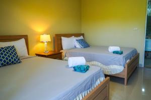 Soficu Hotel El Edén Dominicus客房内的一张或多张床位