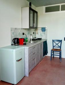 Η κουζίνα ή μικρή κουζίνα στο Elva House