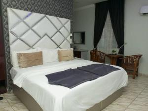 Postel nebo postele na pokoji v ubytování DVANX Apartment