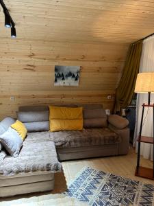 A seating area at Kazbegi cottage kide- ყაზბეგში კოტეჯი კიდე