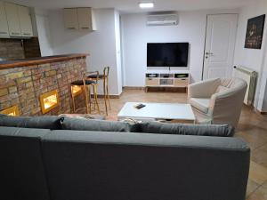 TV a/nebo společenská místnost v ubytování Apartment Queen