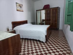 Postel nebo postele na pokoji v ubytování Is Brebus