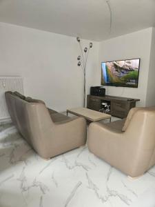 Μια τηλεόραση ή/και κέντρο ψυχαγωγίας στο Appartement refait à neuf 120m2 I chambre #1 sur 4