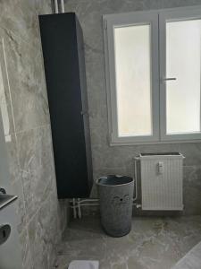 Ένα μπάνιο στο Appartement refait à neuf 120m2 I chambre #1 sur 4