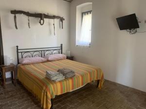 Postel nebo postele na pokoji v ubytování Podere Girasoli