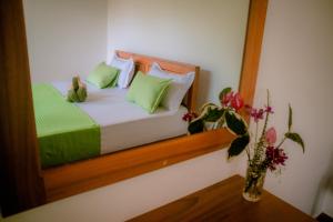 Postel nebo postele na pokoji v ubytování Evergreen Villa - Sinharaja