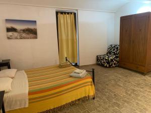 Postel nebo postele na pokoji v ubytování Podere Girasoli