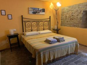 Postel nebo postele na pokoji v ubytování Podere Girasoli