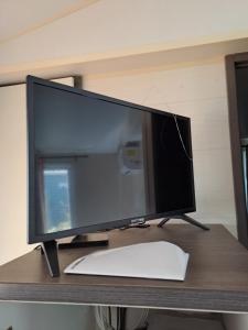 TV a/nebo společenská místnost v ubytování mobile home 047