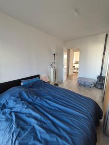 Postel nebo postele na pokoji v ubytování Bel appartement proche Versailles et Paris