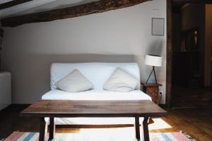 Postel nebo postele na pokoji v ubytování Hotel Rural LATORRIÉN DE ANE