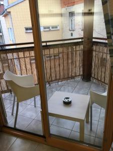Balkón alebo terasa v ubytovaní Apartmán v centru města