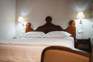 Postel nebo postele na pokoji v ubytování Hotel Rural LATORRIÉN DE ANE
