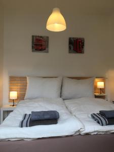 Posteľ alebo postele v izbe v ubytovaní Apartmán v centru města