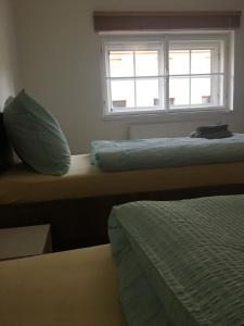 Posteľ alebo postele v izbe v ubytovaní Apartmán v centru města