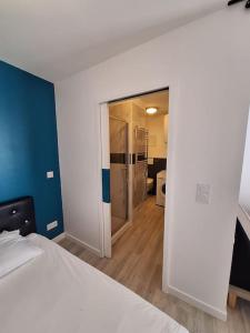 Postel nebo postele na pokoji v ubytování Appartement meublé de tourisme