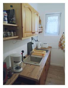 A kitchen or kitchenette at Holiday home in Balatonfenyves 27939